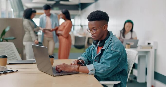 Startup, laptop and black man planning, writing and brainstorming ideas for digital marketing, website design and business. Headphones, technology and creative employee or worker in workspace office