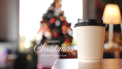 Golden merry christmas text with bokeh lights in the background