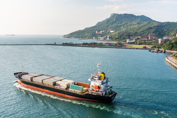 Fototapeta premium View of the large ship leaving Port of Kaohsiung, Taiwan.