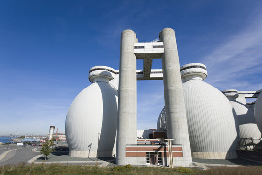 Low angle view of digester tanks in a water treatment plant