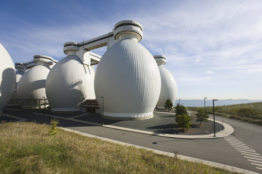 Low angle view of digester tanks in a water treatment plant