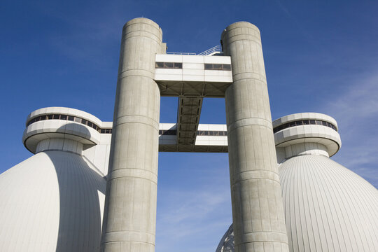 Low angle view of digester tanks in a water treatment plant
