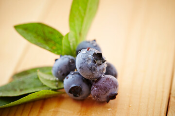 blueberries on a wooden background