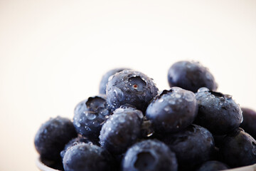Close-up of fresh blueberries with water droplets