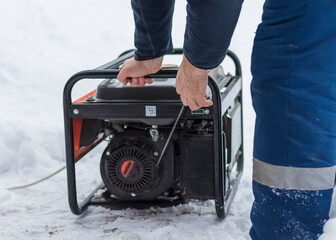 natural light. shallow depth of field. snow. an autonomous generator for generating electricity....