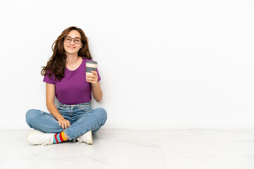 Fototapeta premium Young caucasian woman isolated on white background smiling a lot