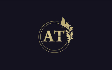 Fototapeta premium Golden leaf and circle logo design vector. Golden beauty logo and business symbol vector design