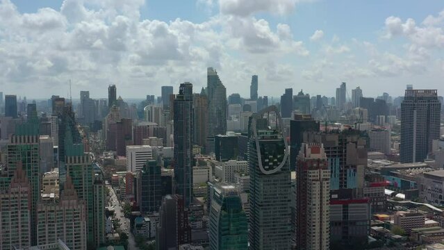 sunny day bangkok downtown office buildings aerial panorama 4k thailand