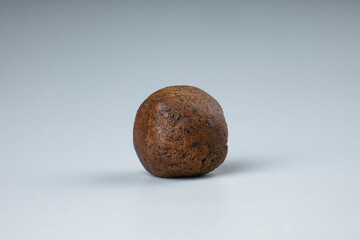 brown ball wtih cannabis hash, moroccan hashish with high thc closeup