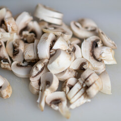 cutted mushrooms on a plastic board
