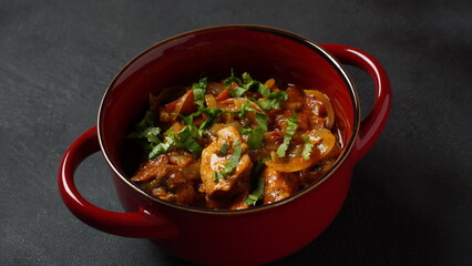 Spanish Chicken stew with tomatoes, onion and spices