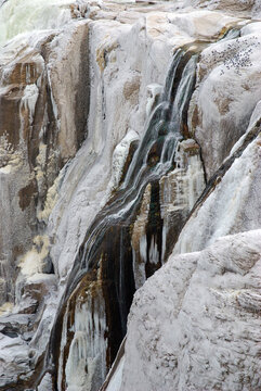 Icy views at Shoshone Falls.  The falls are 212 ft high.; Shoshone Falls, Twin Falls, Idaho, United States of America.