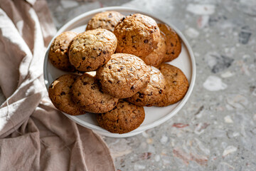 Chocolate chip cookies with chocolate chips on a tray.