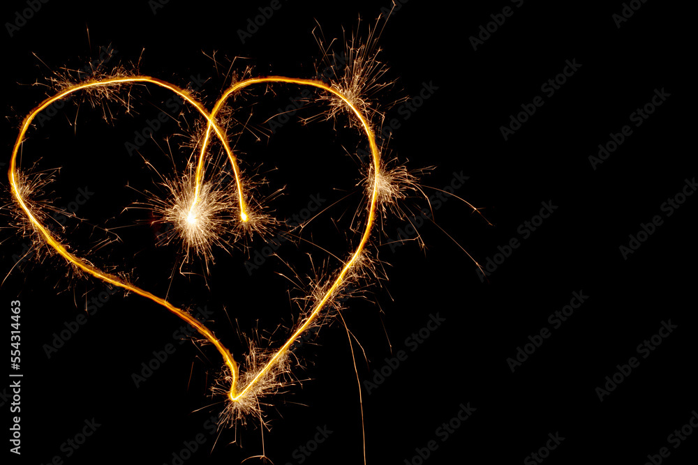 Aufkleber sparklers heart, using a camera with a slow shutter speed
