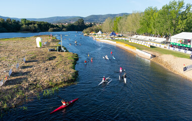 athletes competing canoe race in portugal