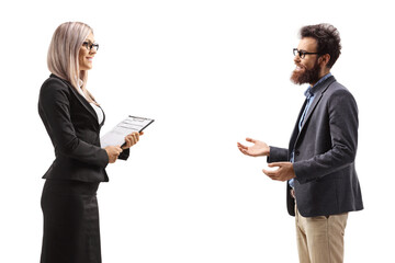 Profile shot of businesswoman having a conversation with a bearded man
