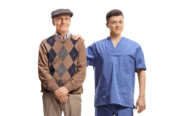 Male physioterapist standing next to an elderly man