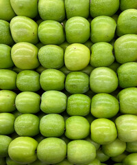 Organic apples displayed at a market stand