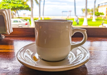 Cup of americano black coffee in restaurant Mexico.