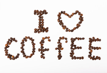 The inscription I LOVE COFFEE with coffee beans isolated on a white background.