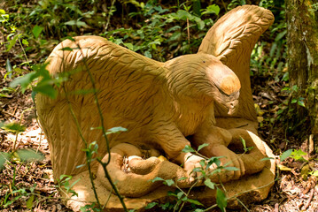 stone statue of an eagle, sculpture garden in Brazil.
