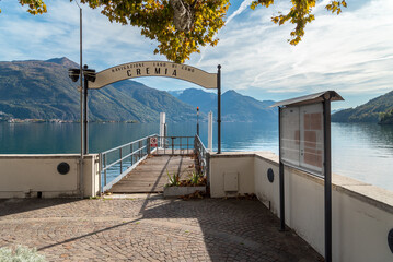 Pier of Cremia village situated on the shore of Lake Como, at autumn time, Lombardy, Italy