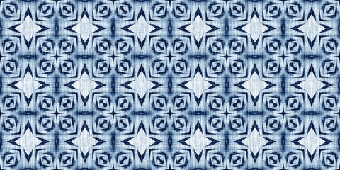 Indigo dye wash coastal damask seamless border pattern. Washed out geometric dip dyed blur effect edging. Nautical and marine ocean blue masculine endless tape background with linen texture trim.