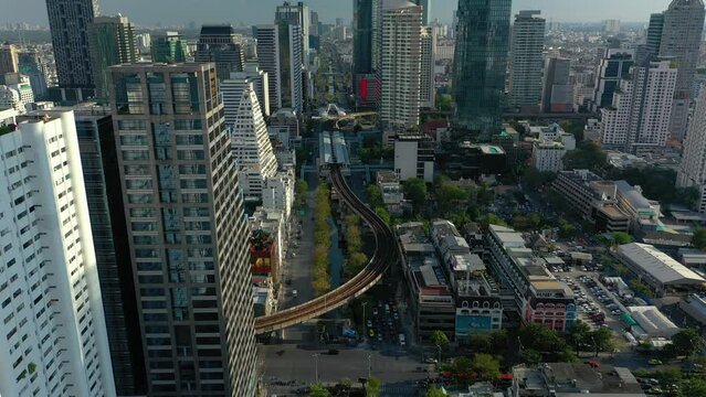 sunny day bangkok city famous central district traffic street metro line station aerial topdown panorama 4k thailand