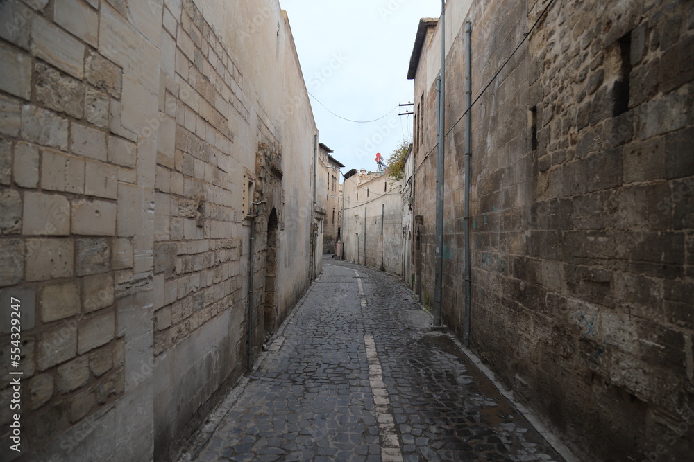 Wall mural narrow street in the town