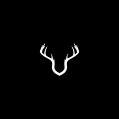 Deer antler shield logo icon isolated on dark background