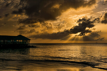 Fototapeta na wymiar sunset at St. James Morgan bay at Saint Lucia Caribbean luxury island
