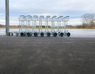 several carts for transporting luggage at an empty bus station. selective focus.High quality photo
