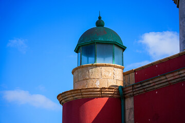 Round corner tower on the guardian house of the lighthouse of El Toston on the north coast of...