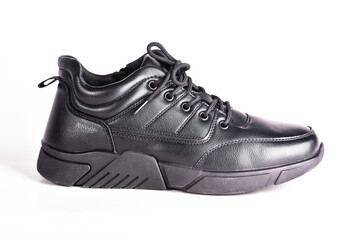 Black winter boot with black laces on a white background