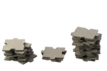 Three piles of gray puzzle pieces. Concept of increasing value.  Slow progress. Isolated on a white background.