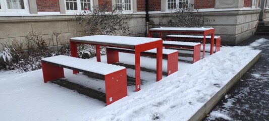 bench covered by snow