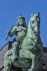 Fototapeta premium Jan Wellem equestrian monument (1711) in front of Dusseldorf Town Hall (Altes Rathaus) at the Market square. Monument shows Jan Wellem dressed in full armor. DUSSELDORF, GERMANY.
