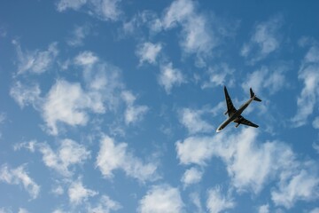 Airplane and passengers going in any direction are driving through the  sky.