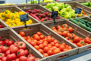 Fresh vegetables on the market counter. Vegetable farmer market counter: colorful various fresh organic healthy vegetables at grocery store. Healthy natural food concept