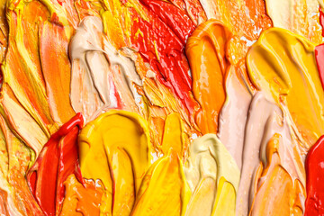 Beautiful strokes of colorful oil paints as background, closeup