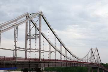 Beautiful view of modern bridge against cloudy sky