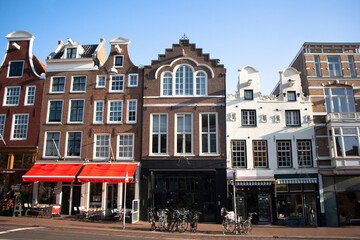 Fototapeta na wymiar View of traditional, touristic, old Amsterdam city centre. Dutch houses.