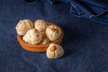Bowl with chipa, typical Paraguayan cheese bread with copy space.