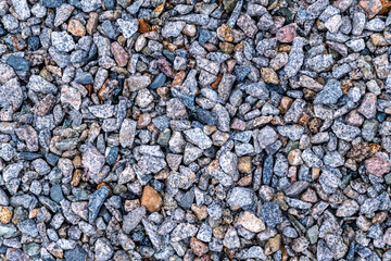 Road construction stones, crushed rock.