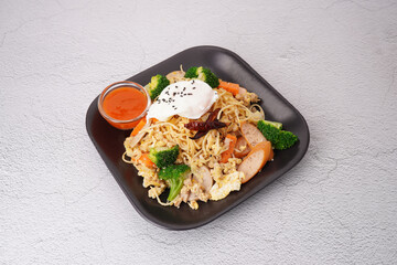 Stir-fried noodles with pork and egg, fresh vegetables