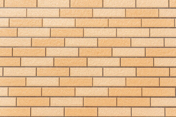 茶色いレンガ調の壁