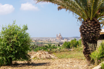 Parish church of St. John the Baptist dominating the skyline of Xewkija, Gozo, Malta