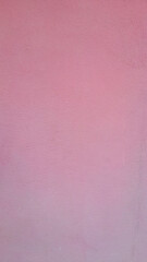 old pink paint on cement surface.