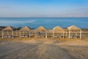 Beach on the Dead Sea in Jordan, a Resort with Beach Chairs in the Morning
