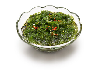 wakame seaweed salad, Japanese food isolated on white background © uckyo